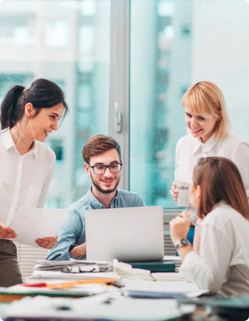 people-gathered-around-laptop